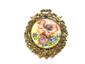 Limoges porcelain brooch. 5.5x6cm Postage A