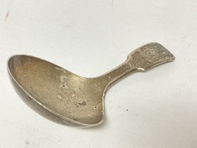 A Georgian hallmarked silver caddy spoon , postage