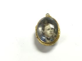 A high grade gold portrait pendant. Approximately