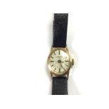 A vintage ladies 9ct gold rotary watch with leathe