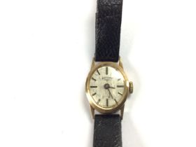 A vintage ladies 9ct gold rotary watch with leathe