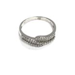 A 9ct white gold diamond dress ring. 2g and size M