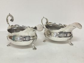 A pair of Silver hallmarked gravy boats, postage c