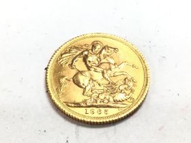 A 1965 full gold sovereign. Postage A