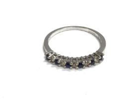 A 9ct sapphire and diamond ring. 1.5g and size N.