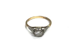 An 18ct gold and platinum diamond set ring. 2.4g a