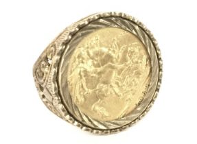 An 1880 sovereign ring, size Q. 14.3g. Postage cat