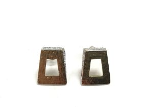 A pair of 9ct gold modern style hammered effect ea
