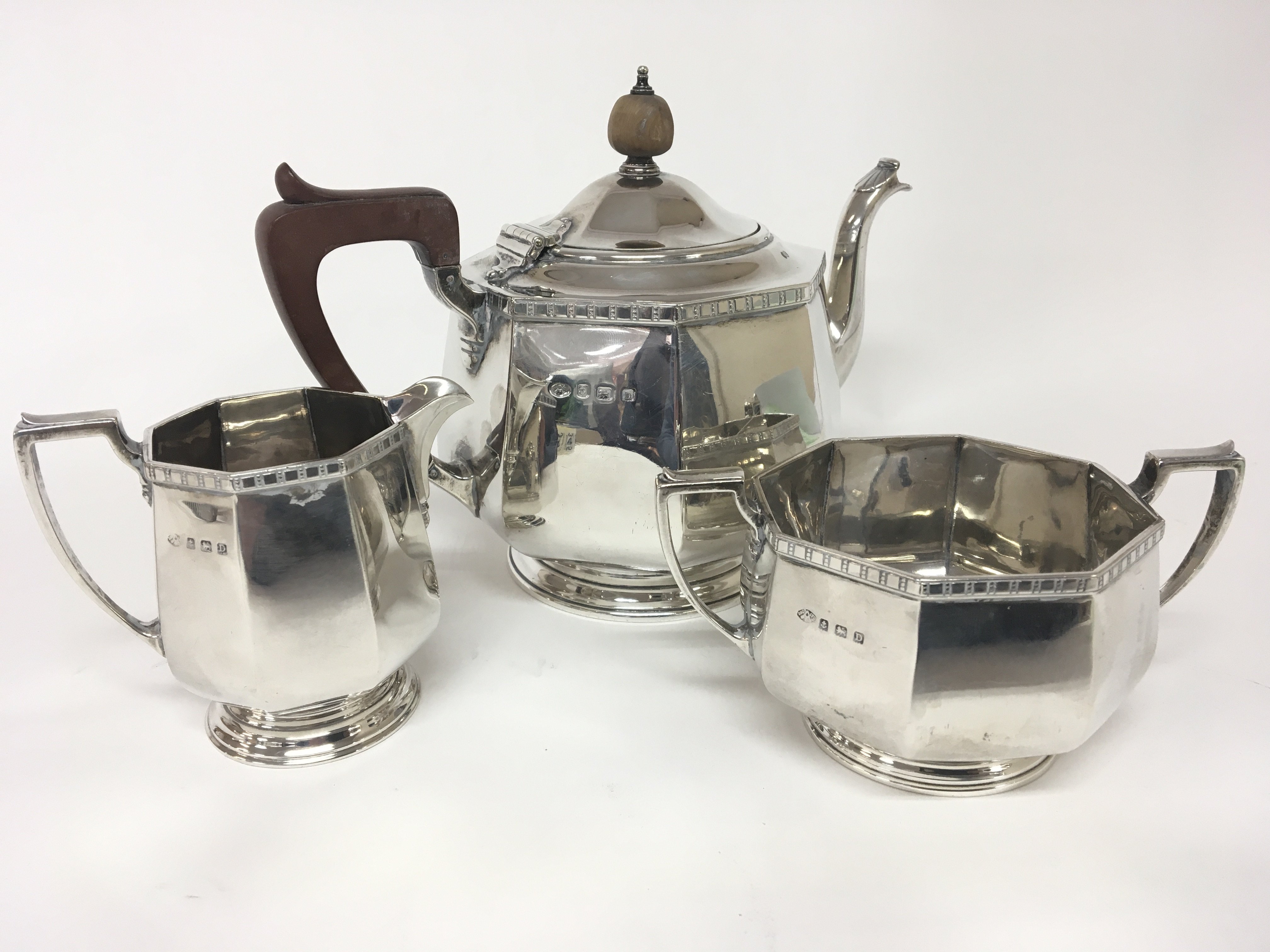 A Silver three piece tea set with Birmingham 1928
