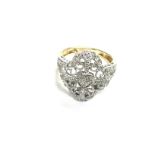 A 14ct gold diamond set filigree ring. Size N and