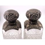 A pair of hallmarked silver and cut glass perfume