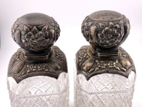 A pair of hallmarked silver and cut glass perfume