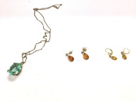 A 9ct gold pendant set with large stone on chain 8