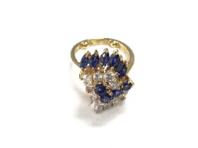 An 18ct gold sapphire and diamond ring. 5.2g and F
