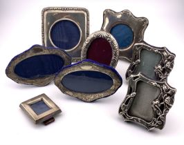 A collection of small hallmarked silver photo fram