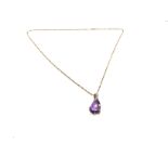 A 9ct modern style cabochon amethyst and diamond p