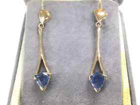 A pair of 9ct gold sapphire drop earrings. Total w