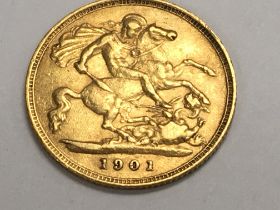 A gold half sovereign dated 1901 .