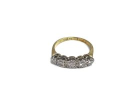 A 14ct gold ring set with 5 diamonds. 2.4g and siz