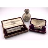 3 Hallmaked silver perfume bottles. 1 cased silver