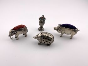 Novelty Hallmarked silver pincushions to include a