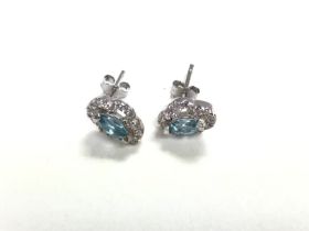 A pair of silver quatrefoil studs set with marquis