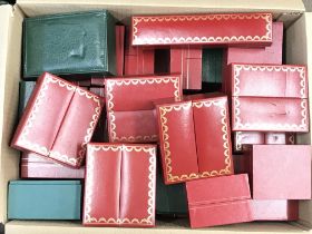 A large collection of various watch boxes, postage