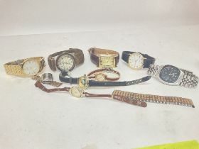 A collection of watches including Versace, Seiko