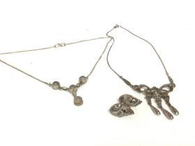 A collection of Silver marasite jewellery includin