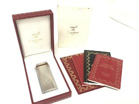 Cartier silver lighter with paperwork and gas , po