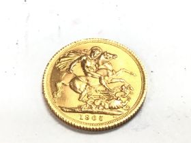 A 1965 full gold sovereign. Postage A