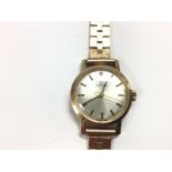 A 9ct ladies vintage Omega watch. Winds and runs.