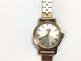 A 9ct ladies vintage Omega watch. Winds and runs.