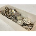 A large collection of watch movements , postage ca