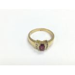 An 18ct gold p, ruby and diamond set ring, approx