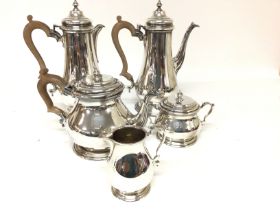 A silver five piece tea and coffee set circa 1976. Approximately 3kg Postage C.