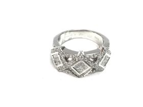A 14ct unique princess diamond set ring. 7.7g and