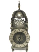 A brass lantern clock with French movement, in wor