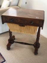 A Quality Early Victorian mahogany free standing work box with a drawer and sliding wool box and