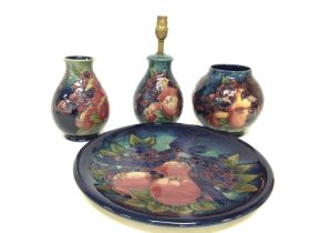 A collection of Moorcroft Finchs and berries porce