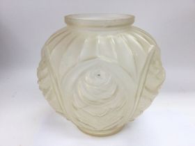 An Art Deco glass vase of ovoid form with raised floral repeating decoration, approx height 20.