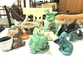 A collection of various ceramics including Poole figurines, Sylvac turtle and cats, Goebel etc.