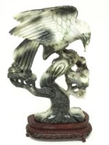 A boxed Jade eagle figure, 27cm tall. postage cate