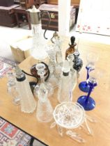 A collection of cut glass including vases, jugs et