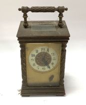 A small gilt brass 4 glass cased carriage clock, (