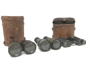 Three pairs of WW1 binoculars including Le Maire F