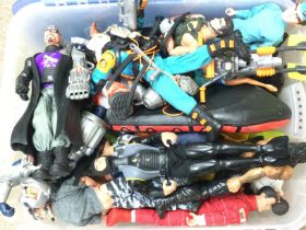A box containing action man & other figures, posta