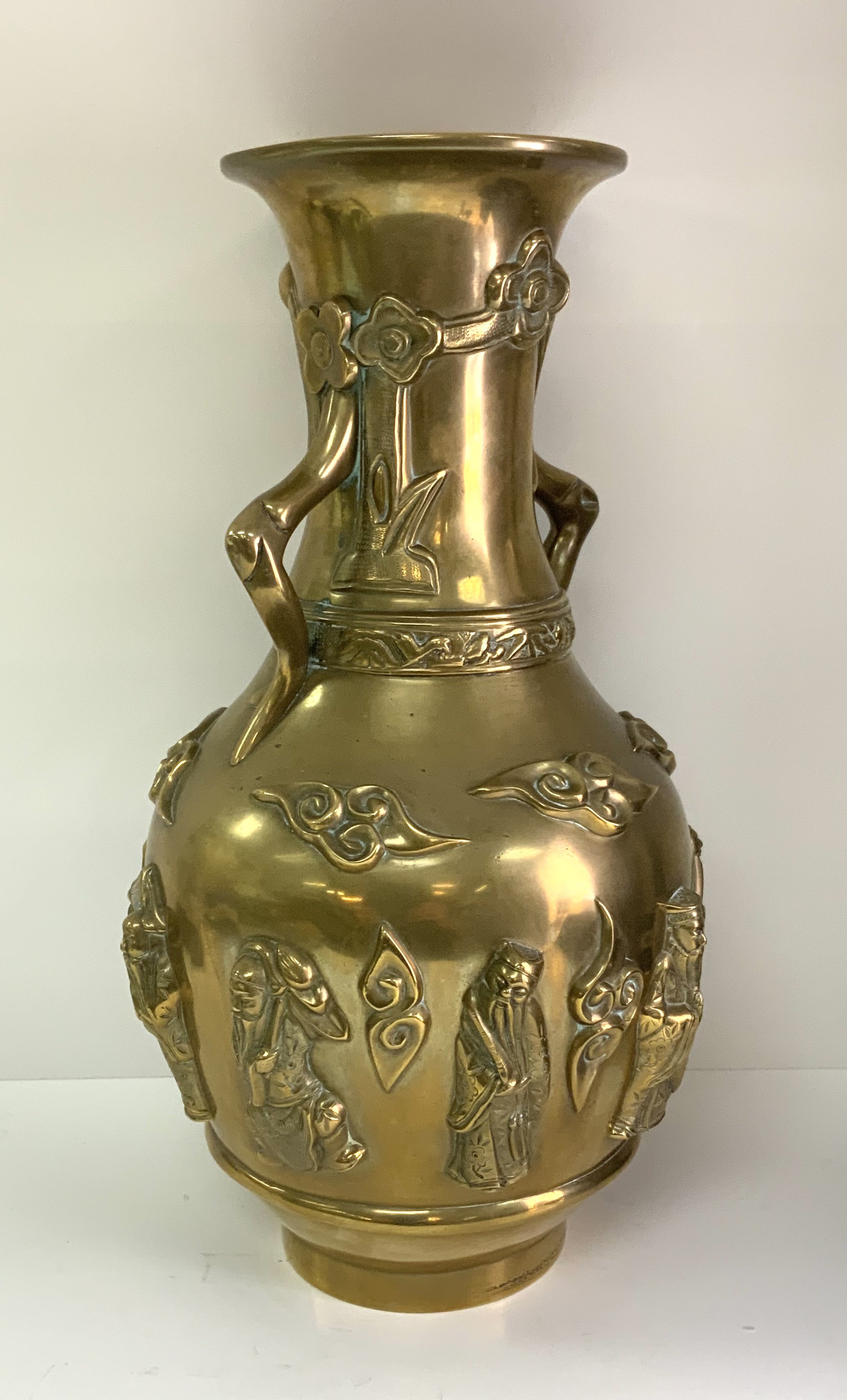 A 19th century Chinese cast bronze vase surrounded by 8 images of immortals. 39cm. - Image 2 of 4