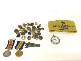 A quantity of military buttons a civil defence arm