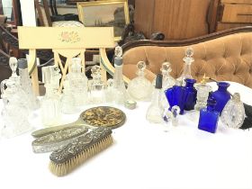 A collection of various cut glass vintage perfume